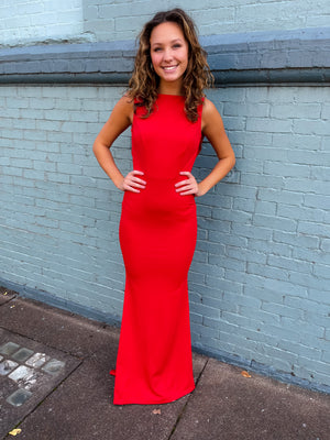 Dress features a solid color, round neck line, ruffle back detailing, sleeveless detail, deep V-neck back detail with ruffles, maxi length, flattering fit and runs true to size! 