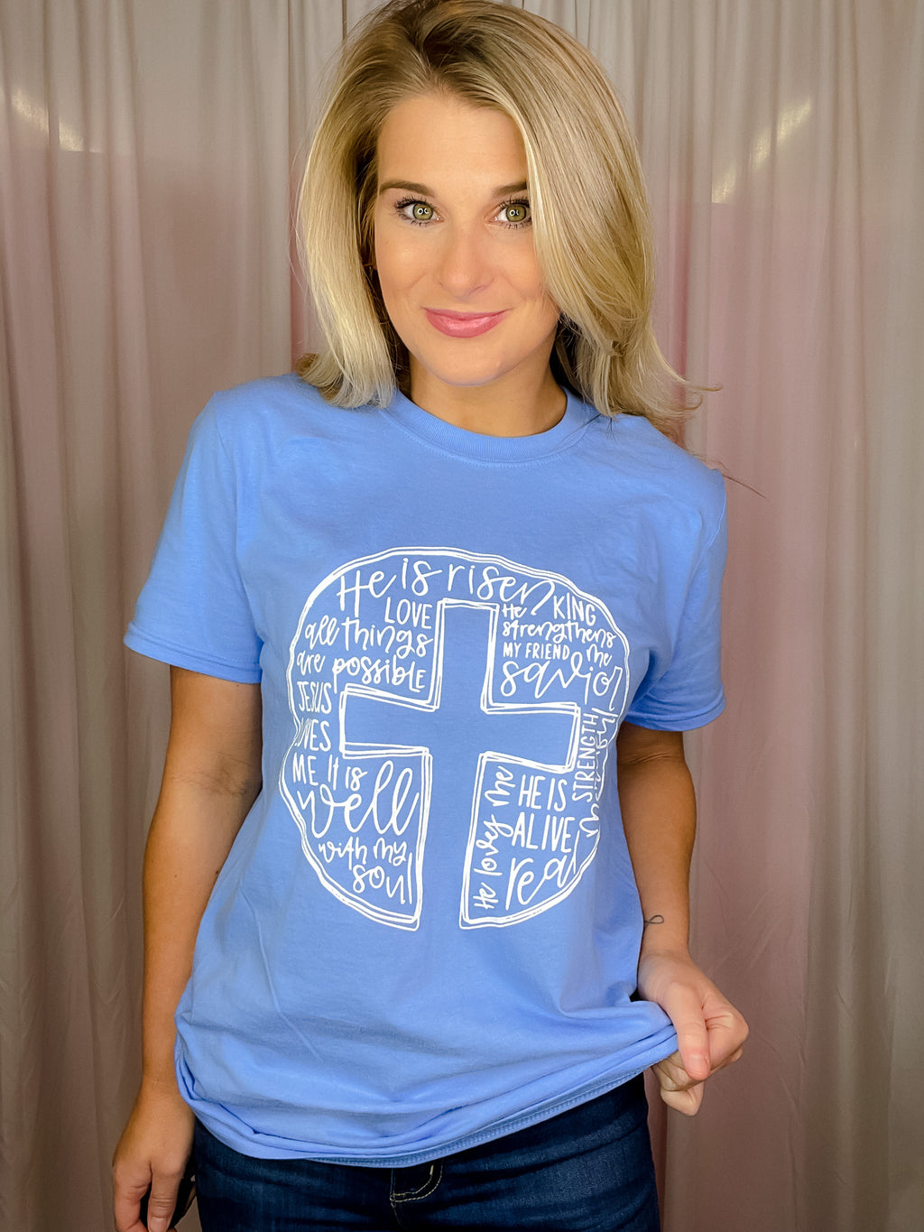 This Scripture Cross Tee is perfect for the Easter season. Its short sleeves, round neck line, and unisex fit make it comfortable and flattering for any body type. The stylish scripture cross design also makes it a great choice for anyone looking for an easy, stylish way to express their faith.-periwinkle 