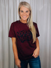 Graphic features a solid base color, short sleeves, unisex fit, black ink design and runs true to size!-maroon