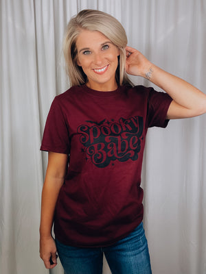 Graphic features a solid base color, short sleeves, unisex fit, black ink design and runs true to size!-maroon