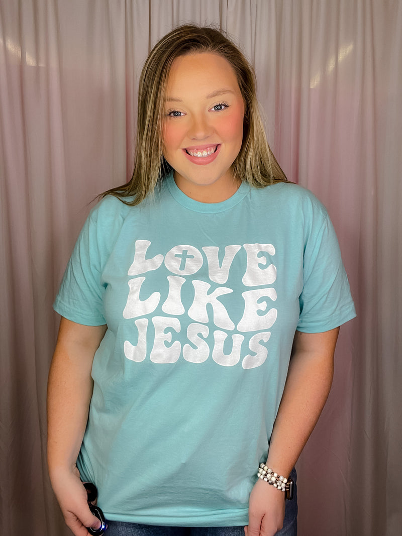 This premium Love Like Jesus Tee is a modern and stylish way to express faith and hope this Easter. Made for a soft and comfortable fit, it features short sleeves, a unisex fit, and a round neck line. With an inspiring "Love Like Jesus" graphic design, it perfectly captures the spirit of the season.-mint