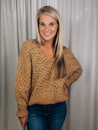 Sweater features a solid base color, long sleeves, V-neck line and runs true to size!-mustard