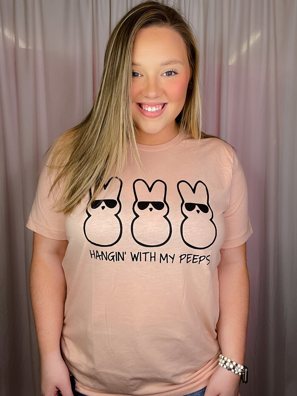 Our Hangin' With My Peeps Tee features a comfortable, unisex fit with a round neckline and short sleeves. This cool design features a cheerful Easter-themed peeps pattern, making it perfect for any season. Crafted from lightweight and breathable fabric, this tee is sure to keep you feeling comfortable as you show off your style.