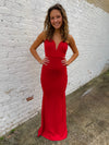 Dress features a maxi length, deep red color, glitter detailing, sweetheart deep V-neck line, strapless detail, mermaid fit and runs true to size! 