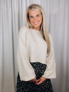 Sweater features a solid base color, round neck line, long sleeves and runs true to size!-beige