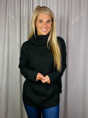 Sweater features a soft waffle knit material, long sleeves, cowl neck line and runs true to size! -hunter green