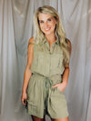 Romper features an olive base, sleeveless detail, tie waist belt, cargo pockets and runs true to size!  Materials: 100% Rayon