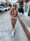 Dress features a solid base color, soft knit material, long sleeves, V-neck line, tie waist band, knee length and runs true to size with a true fitted shape!-mocha