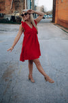 Dress features a tomato red color, short sleeves, ruffle detailing, flattering fit and runs true to size! 
