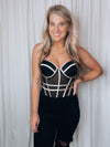 Bodysuit features a solid base color, mesh body, bra cup, sleeveless, adjustable straps, button closure and runs true to size! -black