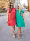 Dress features a solid base color, ruffle short sleeves/ neck, lightweight material and runs true to size! 