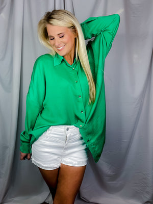Top features solid base color, long sleeves, button down fit, thin material and runs true to size!-kelly green