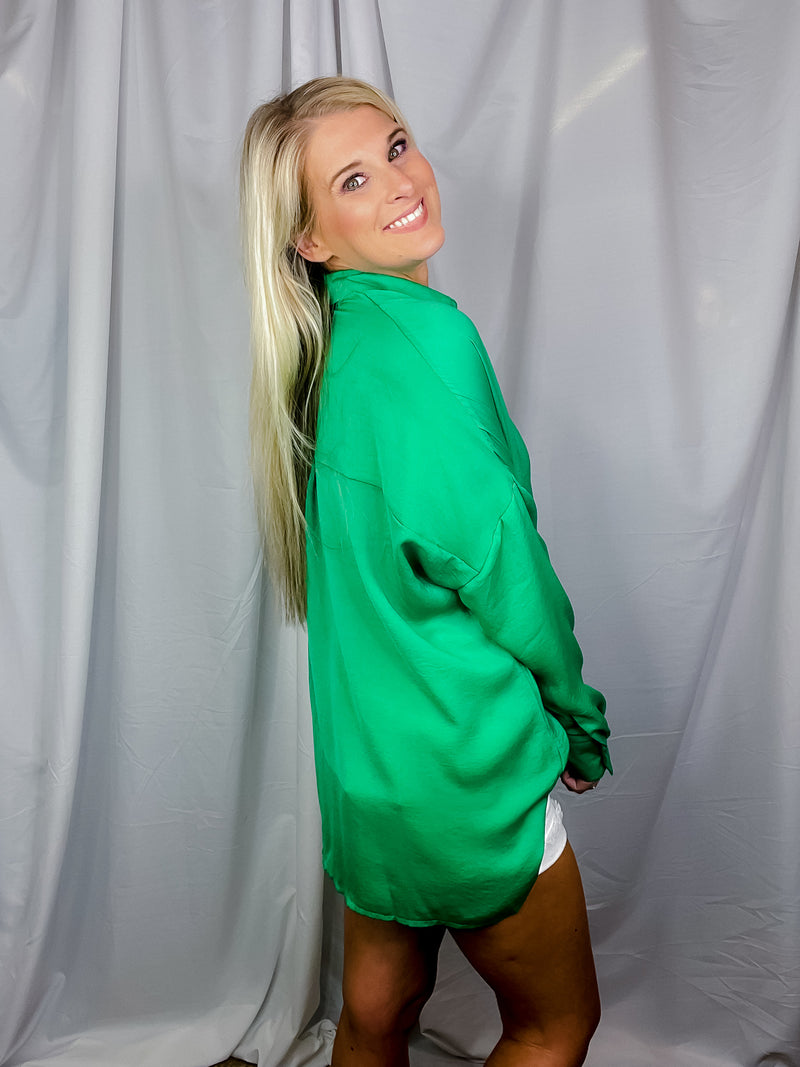 Top features solid base color, long sleeves, button down fit, thin material and runs true to size!-kelly green