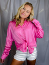 Top features solid base color, long sleeves, button down fit, thin material and runs true to size!-hot pink