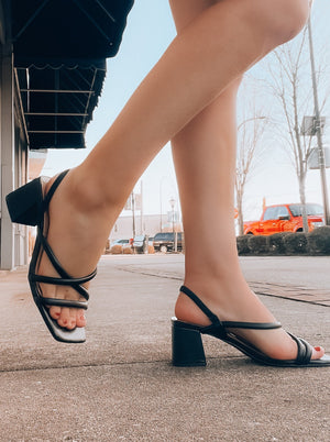 The Slip Into Style Heels offer a compelling option for formal occasions. Featuring a stylish strap detail, a sleek small heel and a sophisticated finish, they're perfect for weddings and everyday wear. Experience the elegance and ease of a soft and comfortable fit, creating the perfect look for any event.-black