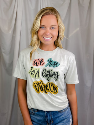 We Rise By Lifting Others Tee (S-2XL)