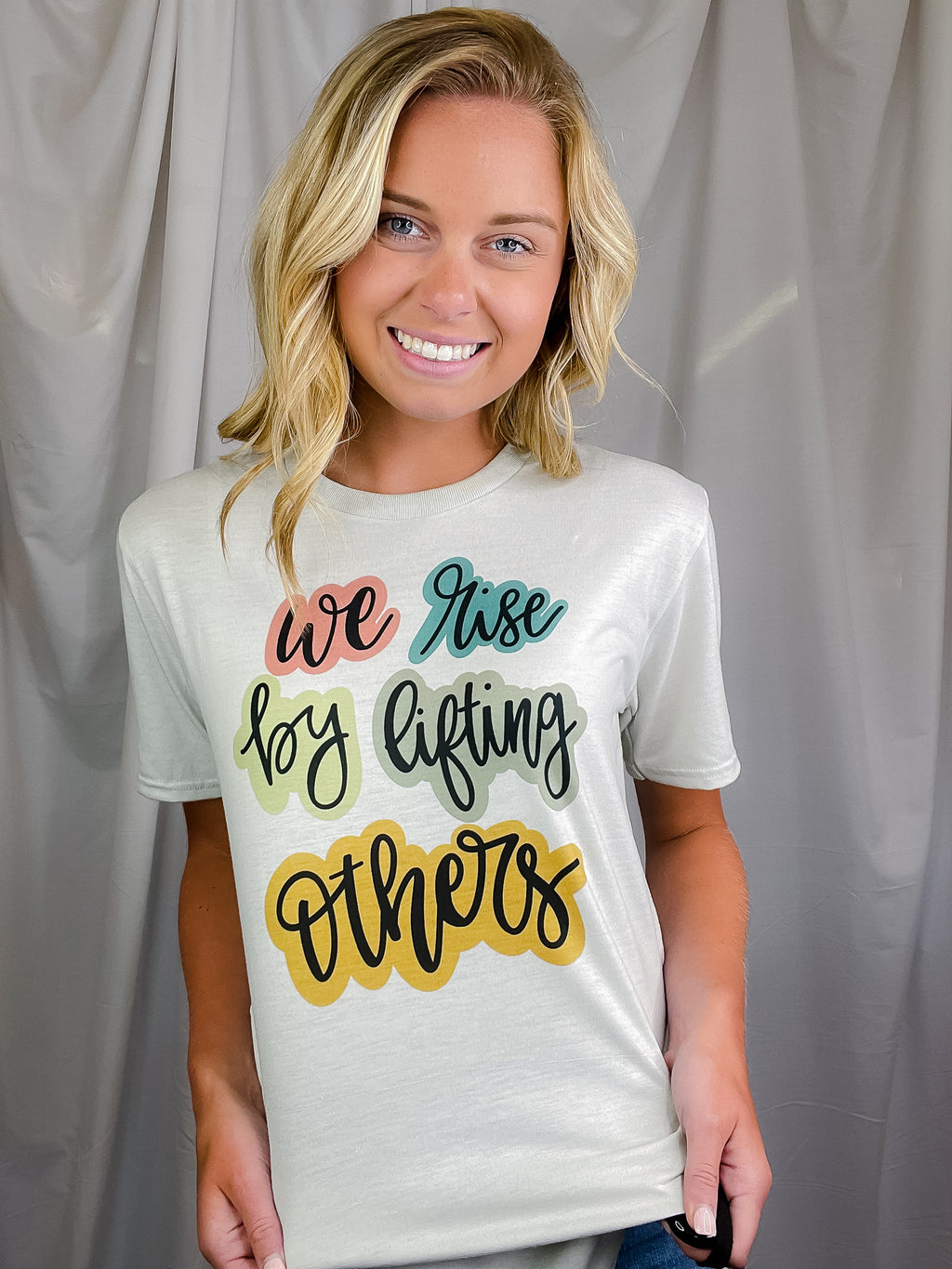 We Rise By Lifting Others Tee (S-2XL)
