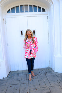 Blazer features a fun pink and white floral detail, long sleeves, collared detail, functional pockets, underlining detail, shoulder pads and runs true to size!