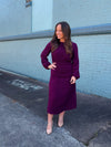 Midi features a egg plant color, long sleeves, ruching side detail, round neck line and runs true to size! 