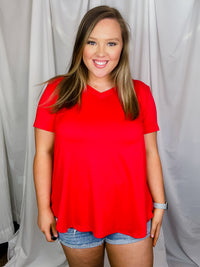 Top features a solid base color, butter fabric soft material, short sleeves, round neck line, and runs true to size!-red