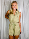 Romper features an olive base, sleeveless detail, tie waist belt, cargo pockets and runs true to size!  Materials: 100% Rayon