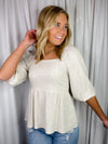 Top features a solid base color, soft linen material, long sleeves, square neck line, baby doll fit and runs true to size! 