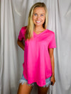 Top features a solid base color, butter fabric soft material, short sleeves, round neck line, and runs true to size!-pink
