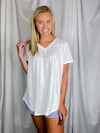 Top features a solid base color, butter fabric soft material, short sleeves, round neck line, and runs true to size!-white