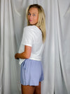 Top features a solid base color, butter fabric soft material, short sleeves, round neck line, and runs true to size!-white