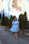 Dress features a stunning powder blue color, solid butterfly sleeve, ruffle tiered skirt, side pockets, round neck line, and runs true to size! 