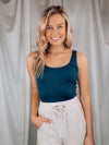 Bodysuit features a simple and flattering scoop neck with a soft, stretchy material.-navy
