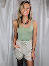 Bodysuit features a simple and flattering scoop neck with a soft, stretchy material.-sage