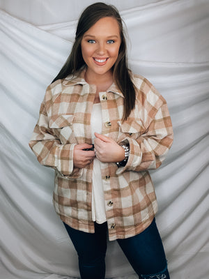Shacket features a plaid detail, front chest pockets, open front, button closure, collar detail, fitted wrist, and runs true to size!   95% Polyester/ 5% Wool -BLUSH