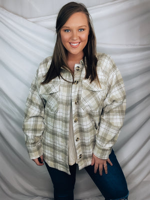Shacket features a plaid detail, front chest pockets, open front, button closure, collar detail, fitted wrist, and runs true to size!   95% Polyester/ 5% Wool-BEIGE