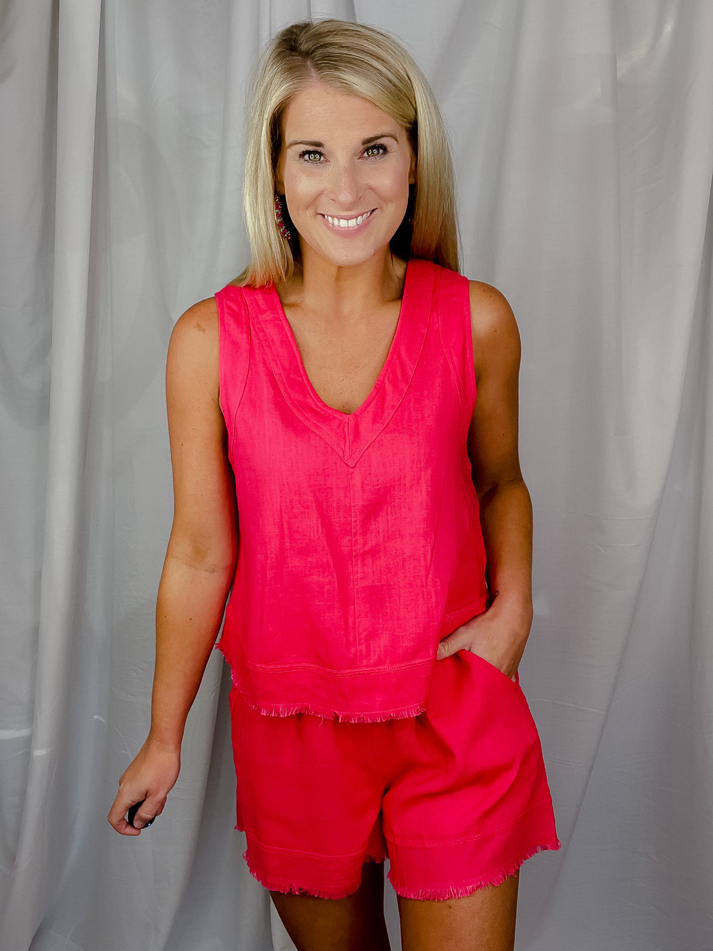 Set features a solid base color, tank/ short set, beautiful watermelon color, fray detailing and runs true to size!   Materials: 80% Viscose / 20% Linen 