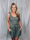 Romper features a dark olive color, soft waffle thermal material, short sleeves, elastic waist, cut-out back detail and runs true to size! PERFECT because you can wear your normal bra with this bad boy and still show some unique flattering cut outs. 