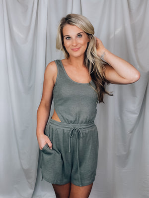 Romper features a dark olive color, soft waffle thermal material, short sleeves, elastic waist, cut-out back detail and runs true to size! PERFECT because you can wear your normal bra with this bad boy and still show some unique flattering cut outs. 