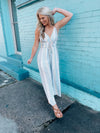 Jumpsuit features a multi color striped print, long pants, basic top, thin stripes, flattering fit and runs true to size! 