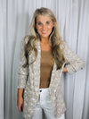 Blazer features a mocha & white coloring, zebra print detail collared detail, 3/4 sleeves and runs true to size! 