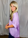 Top features a soft silk material, round neck line, short sleeves, oversized fit and runs true to size!-lavender