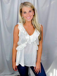 Top features a solid base color, V-neck line, short sleeves, baby doll fit, silk material and runs true to size!-off white