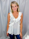 Top features a solid base color, V-neck line, short sleeves, baby doll fit, silk material and runs true to size!-off white