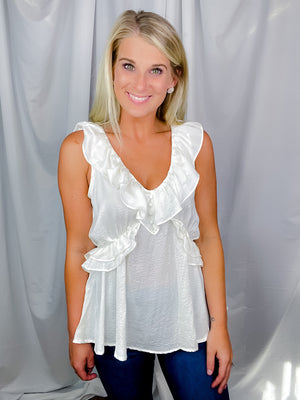 Top features a solid base color, V-neck line, short sleeves, baby doll fit, silk material and runs true to size!-off white