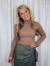 Top features a solid base color, soft ribbed material, long sleeves, high round neck line and runs true to size!-coco