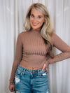 Top features a solid base color, soft ribbed material, long sleeves, high round neck line and runs true to size!-coco