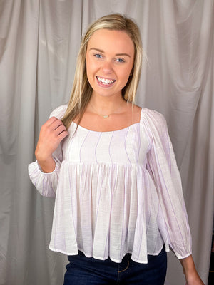 Top features a white base, dark pink stripes, long sleeves, square neck line, on/off the shoulder detail, lightweight material and runs true to size! 