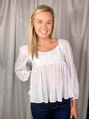 Top features a white base, dark pink stripes, long sleeves, square neck line, on/off the shoulder detail, lightweight material and runs true to size! 