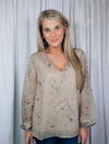 Top features a taupe base, black floral print, underlining, long sleeves, V-neck line, and runs true to size! 