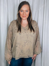 Top features a taupe base, black floral print, underlining, long sleeves, V-neck line, and runs true to size! 