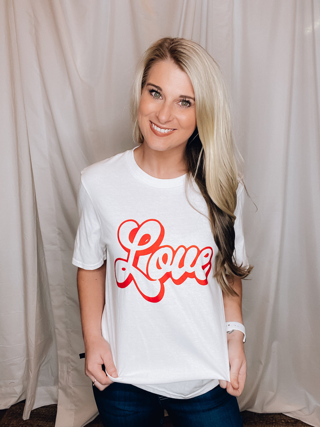 Graphic tee features a solid base color, red ink, retro 3D font, unisex fit, short sleeves, legging approval and runs true to size!-WHITE